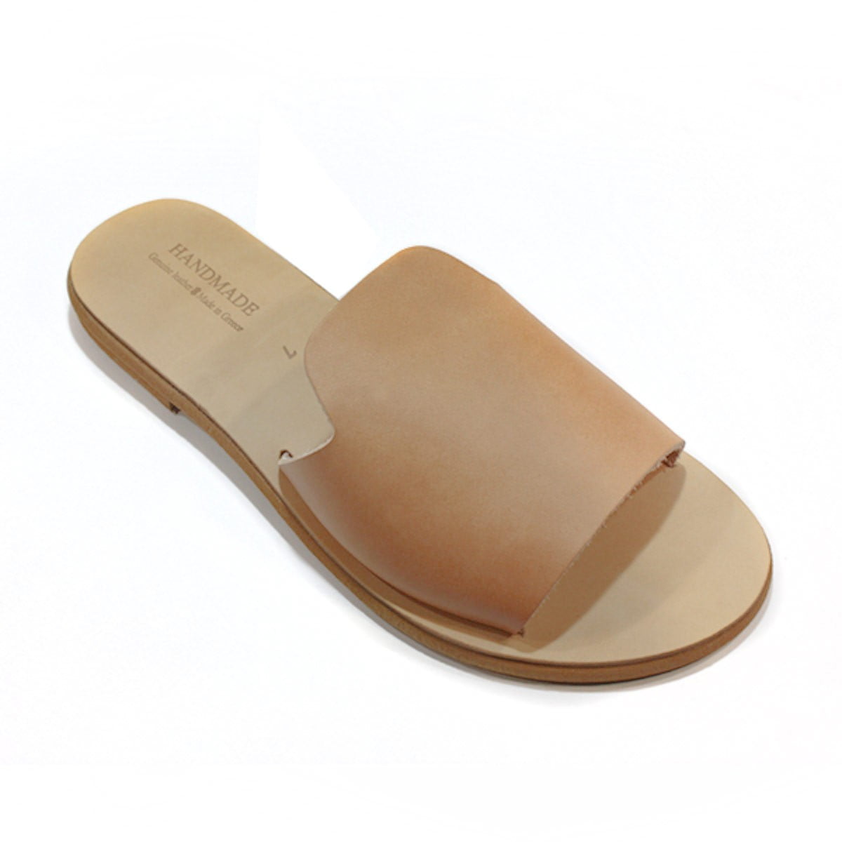 Tan Leather Slide Sandal with a Wide Strap and Flat Sole Front Angled View