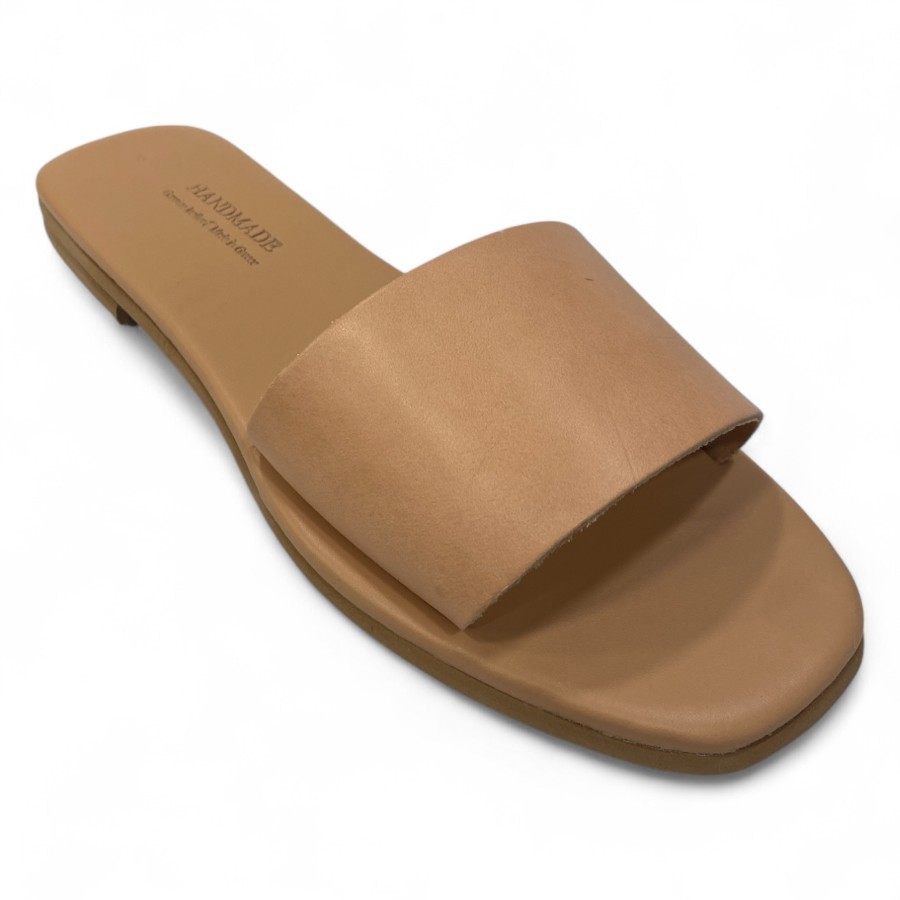 Tan Slide Sandal with a Wide Single Strap on a Light Background Showing an Open Toe and Flat Sole