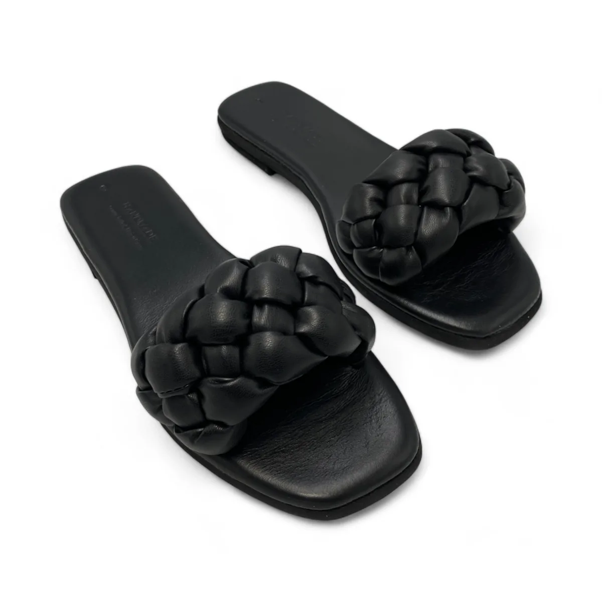 Pair of black braided-strap slide sandals on a flat sole, shown from an angled top view.